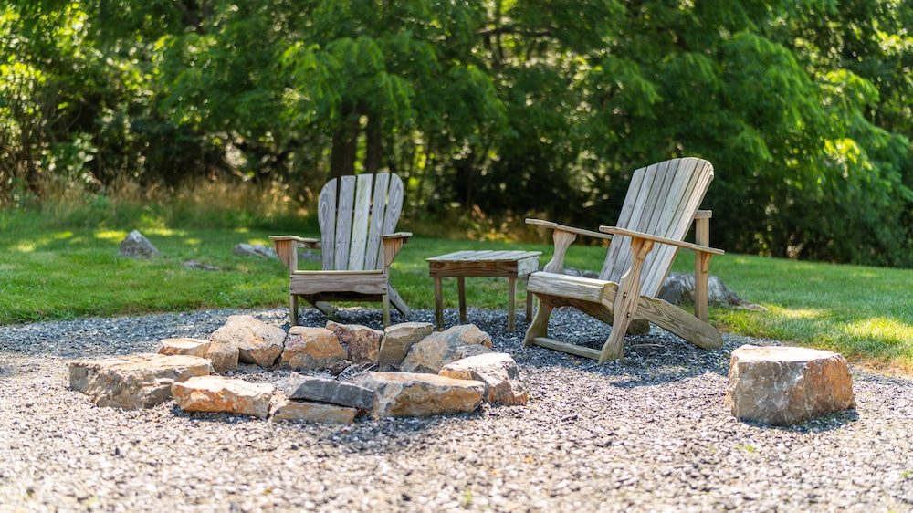 Chairs by our firepit - the perfect place to relax and unwind at our stunning grounds at our Shenandoah Valley Cabins